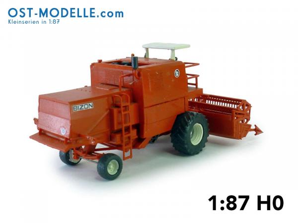 Mähdrescher BIZON Z056 mit Sonnendach 5m Schneidwerk und Transportwagen rot